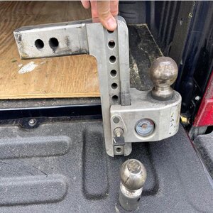 Our expert holding a Weigh Safe 180 Boat Trailer hitch
