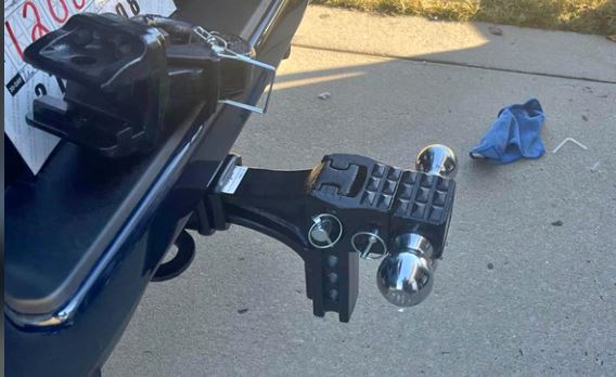 Adjustable weight distribution hitch on a lifted truck